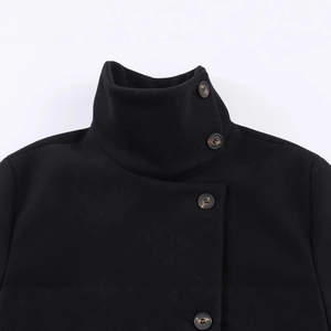 Women's black high stand collar wool coat with dark tortoiseshell buttons in detail view