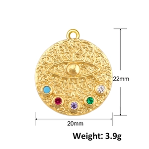 Detail view of gold evil eye pendant with 20mm width and 3.9g weight specifications