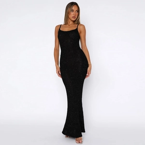 Detailed view of black rhinestone backless maxi dress with sparkling sequin fabric texture