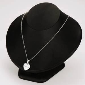 Silver stainless steel heart pendant necklace with Forever Loved engraving on mannequin