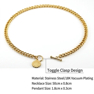 Detailed macro view of 18K gold plated stainless steel Cuban chain with OT toggle clasp and sun pendant