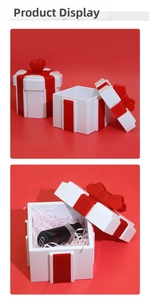 Octagonal Christmas gift box with ribbon lid and interior perfume bottle display