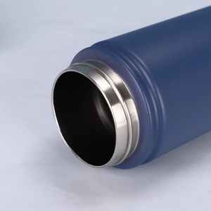 Close-up of a blue matte stainless steel vacuum flask mouth and smooth interior