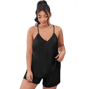 Women's black satin pajama set with V-neck camisole and matching shorts set