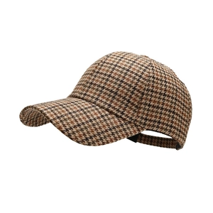 Classic brown houndstooth tweed baseball cap with adjustable strap and curved brim