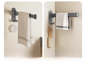 Wall-mounted dark gray rotating metal rack for towels and cloths in bathroom or kitchen