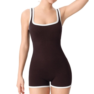 Brown ribbed knit sleeveless bodysuit with white contrast binding for fitness and yoga