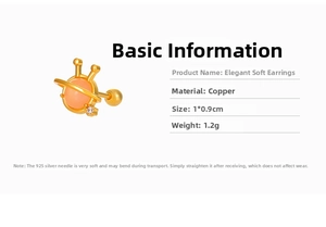 Saturn-shaped gold earring detail with pink gemstone and S925 silver needle material info