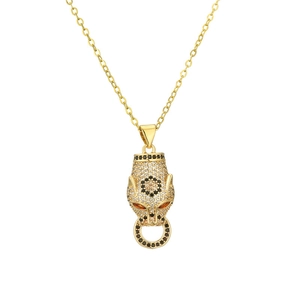 Collana con ciondolo a testa di leopardo dorata con zirconi e pietre color ambra
