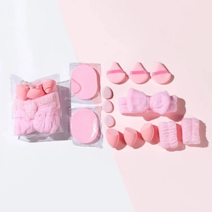 Pink makeup tool set including sponge blenders, powder puffs, headband and wristbands