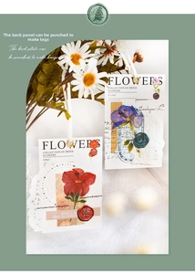 Close-up of handmade dried flower tags with wax seals and white ribbons on lace