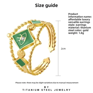 Detailed size guide for gold titanium steel hoop earrings with green planet charms