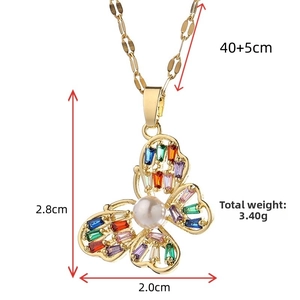 Detail showing butterfly pendant dimensions 2.8x2.0cm and 3.40g weight on gold chain