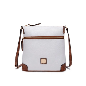 Detail of white pebble leather crossbody bag with brown trim and metal logo plate