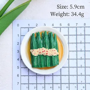 Detailed size and weight view of 5.9cm miniature vegetable food magnet on grid board