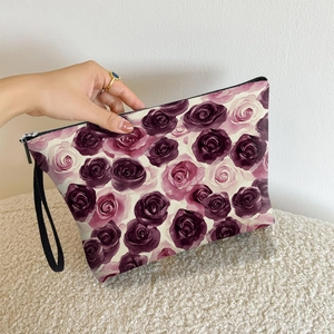 Portable purple rose floral makeup bag with zipper closure and wrist strap for women