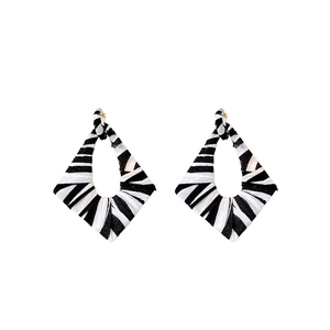 Chic zebra print fabric diamond drop earrings with golden hooks on white background