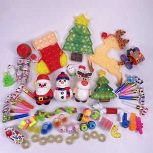 Detailed spread of Christmas advent calendar toys including sensory fidgets and silicone poppers