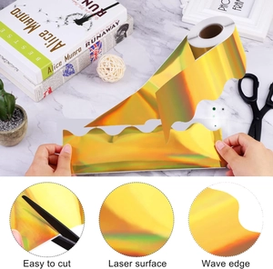 Close-up of wavy gold laser border trim for bulletin boards with easy-to-cut feature
