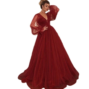 Elegant deep V-neck evening gown with sheer puff sleeves and shimmering sequins