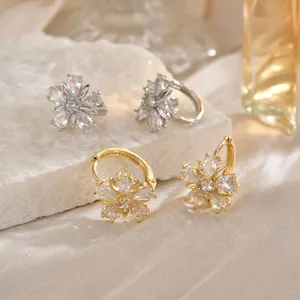 Elegant floral stud earrings with sparkling marquise zircons in gold and silver finish