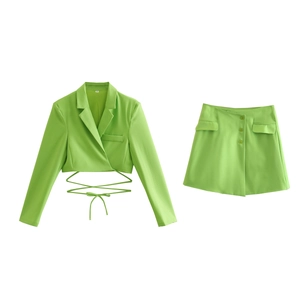 Grass green two-piece suit with cropped tie-up blazer and slim mini skirt for women