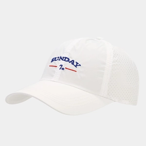 Detail of white quick-dry baseball cap featuring Sunday embroidery and laser-cut vents