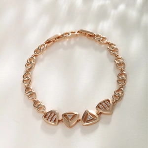 Elegant rose gold geometric triangle bracelet with sparkling zircon stones for women