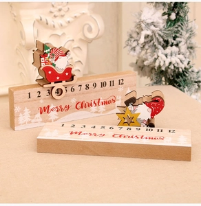 Close-up of wooden Christmas countdown calendar with sliding Santa and gnome figures