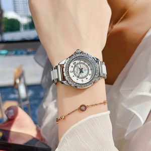 Elegant silver watch for women with mother of pearl dial and crystal bezel