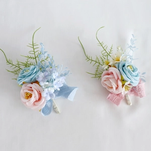 Handmade silk rose boutonniere set in pink and blue for wedding groom and bride