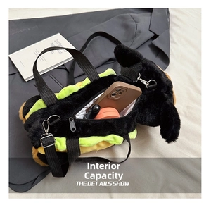 Interior view showing the capacity for a mobile phone and makeup inside the plush dog bag
