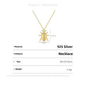 Detail view of gold-plated S925 silver spider pendant with purple zircon and dimensions
