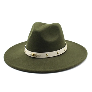 Detail of dark green felt fedora hat with white leather band and gold stud accents