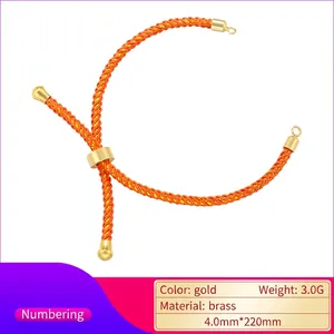 Verstellbares, 18 Karat vergoldetes oranges Milan-Kordelarmband mit Messing-Akzenten