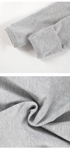 Detailed view of gray knit fabric and ribbed cuffs for newborn baby swaddle sleeping bag