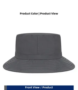 Detailed front view of dark gray bucket hat showing textured quick-dry fabric and stitching