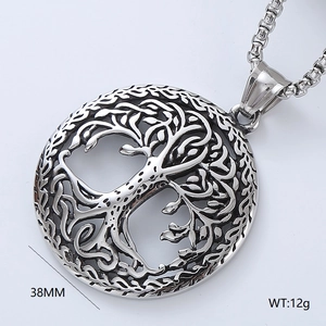 Macro detail of Tree of Life pendant in polished silver steel with 38MM size and weight mark
