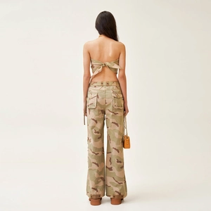 Two-piece camouflage set with bandeau top and wide-leg cargo pants in earthy tones