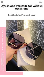 Detail view of large geometric sunglasses with gradient lenses and a leather case