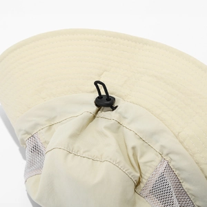 Detail of adjustable drawstring and mesh vents on khaki outdoor sun hat for breathability