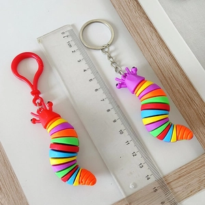 Rainbow flexible caterpillar keychain with 15cm measurement ruler for size reference
