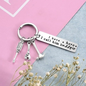 Father's Day key ring with I have a hero I call him Daddy tag and mini tools