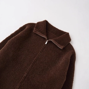 Women's dark brown faux fur bomber jacket with silver zipper and turnover collar