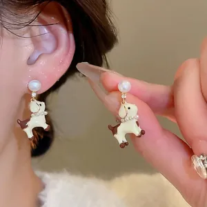 Cute puppy drop earrings with pearl studs and enamel dog charm in cream and brown