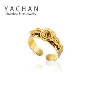 Retro golden stainless steel open ring with round sphere relief and hammered texture