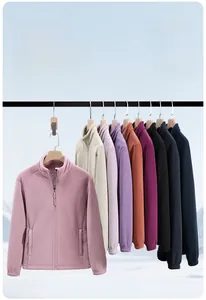 Detail of soft polar fleece lining and zipper pocket on winter thermal jacket