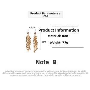 Detailed view of gold leaf tassel earrings with size dimensions 1.8cm by 8cm
