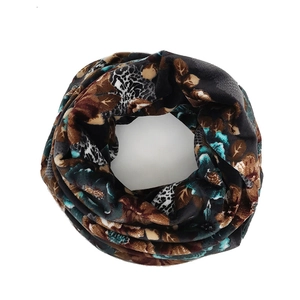 Detail of soft fleece infinity scarf with leopard print and abstract floral pattern