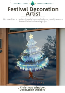 Detail of blue Christmas tree window sticker with festive lights and Merry Christmas text